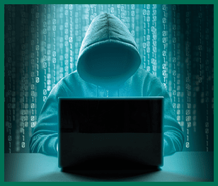 Hacker attack  Dangerous Hooded Hacker Breaks into Government Data Servers  Faceless hooded anonymous computer hacker on dark green background  Internet crime and electronic banking security