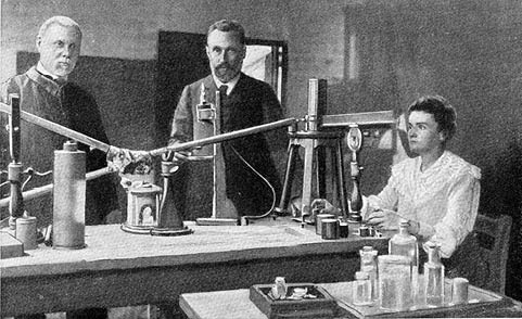 Mr and Mrs Curie in their laboratory, vintage engraved illustration. From the Universe and Humanity, 1910.